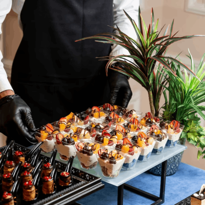 cup-dessert-with-whipped-cream-strawberries-cherries-orange_140725-3536